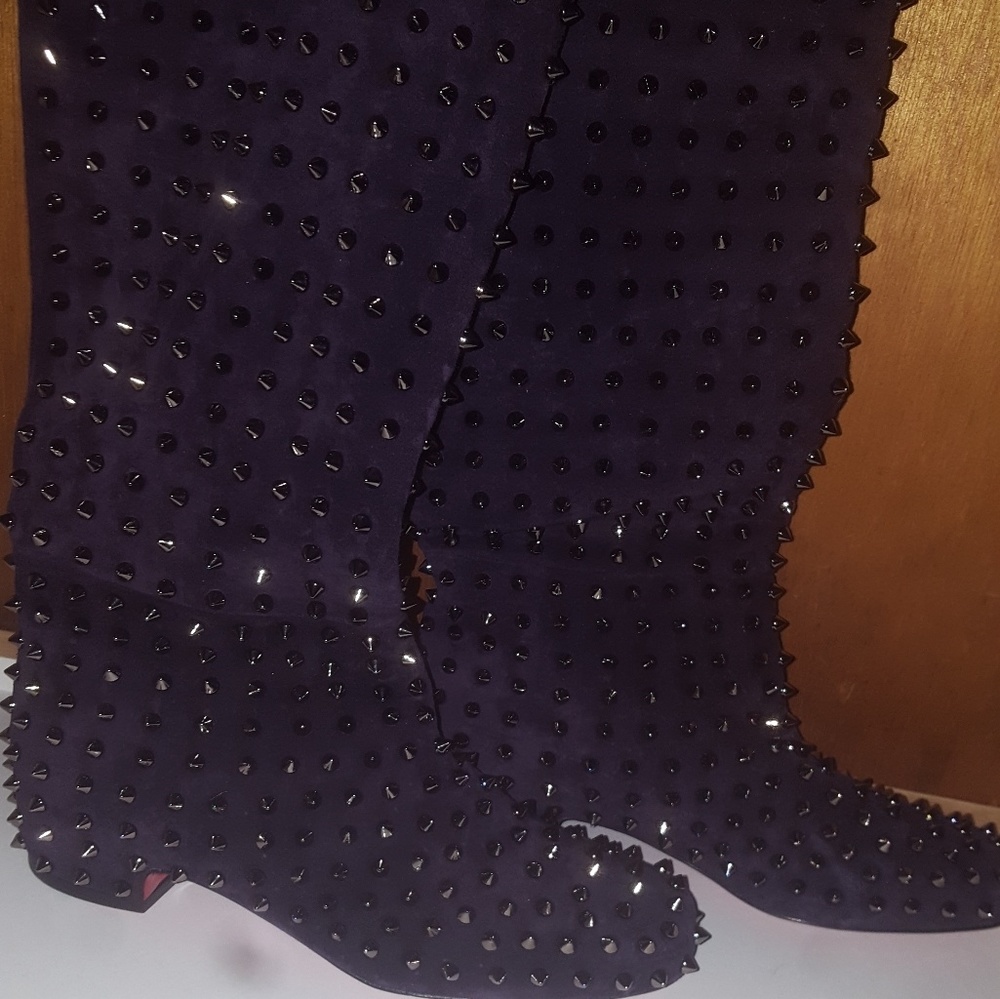 Christian Louboutin flat spike boots
